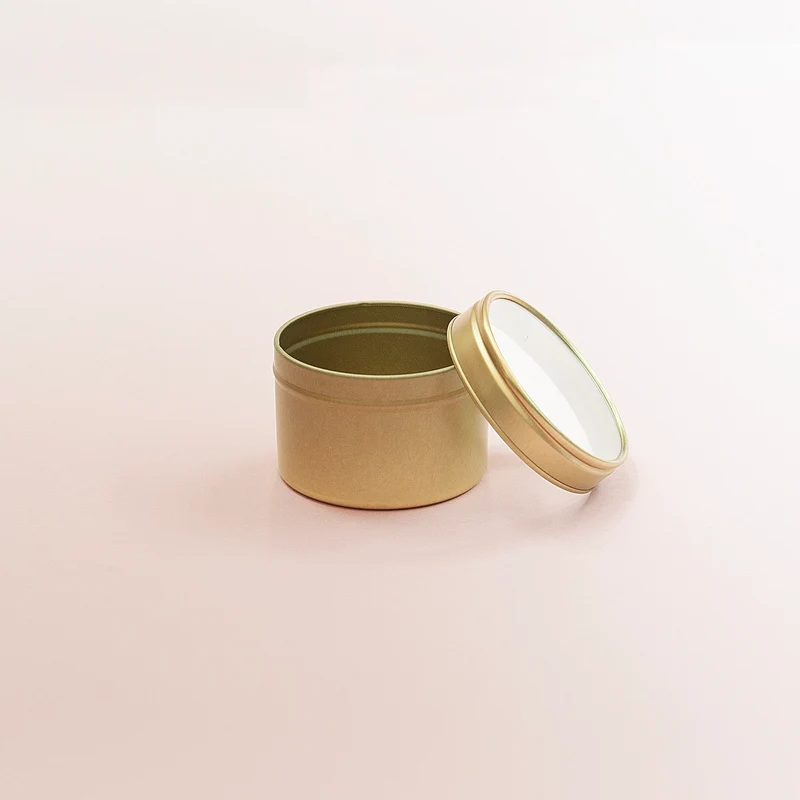 Boîte métallique dorée avec couvercle transparent 100 ml
