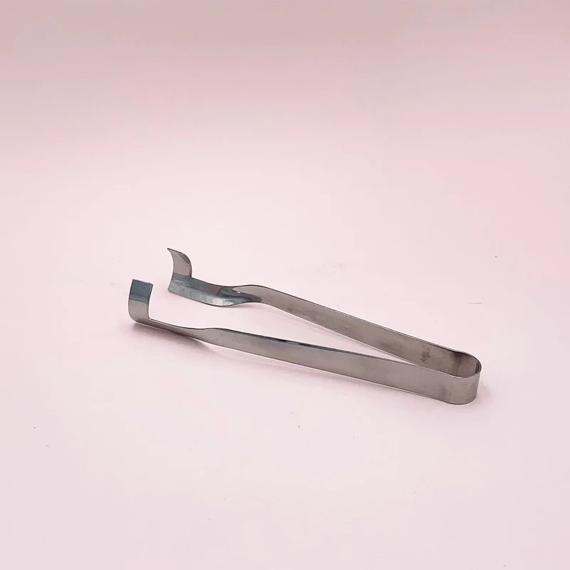 Pince pour bougies chauffe-plat