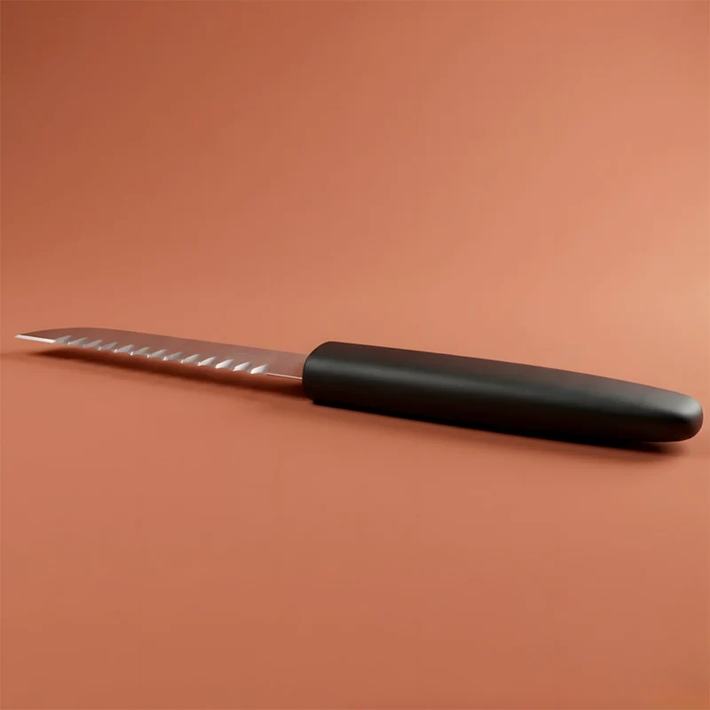 Couteau dentelé Victorinox pour sculpter la cire