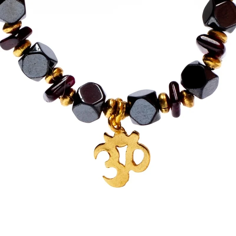 Armband hematiet/granaat facet met ohm elastisch
