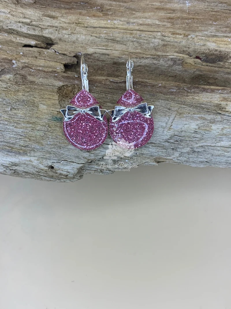 Boucles d’oreilles pailleté rosé noeud argenté
