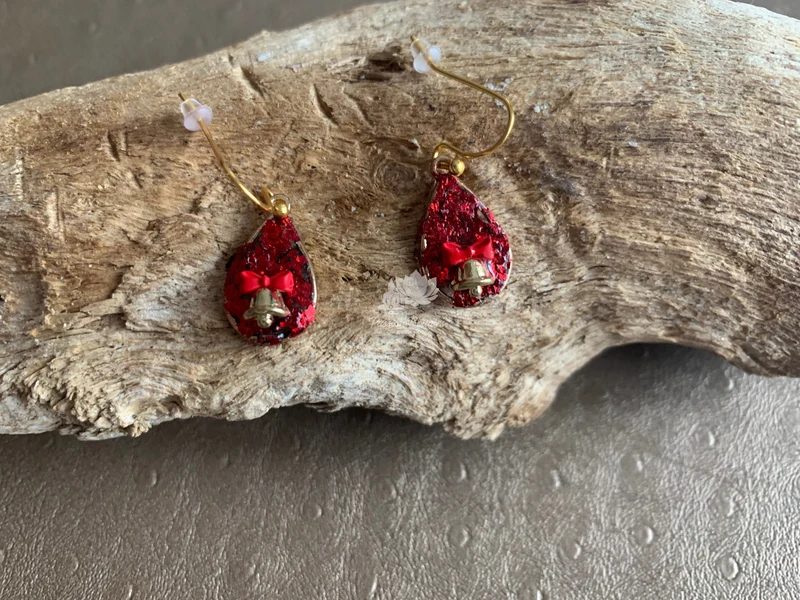 Boucles d’oreilles noeud cloche de Noël