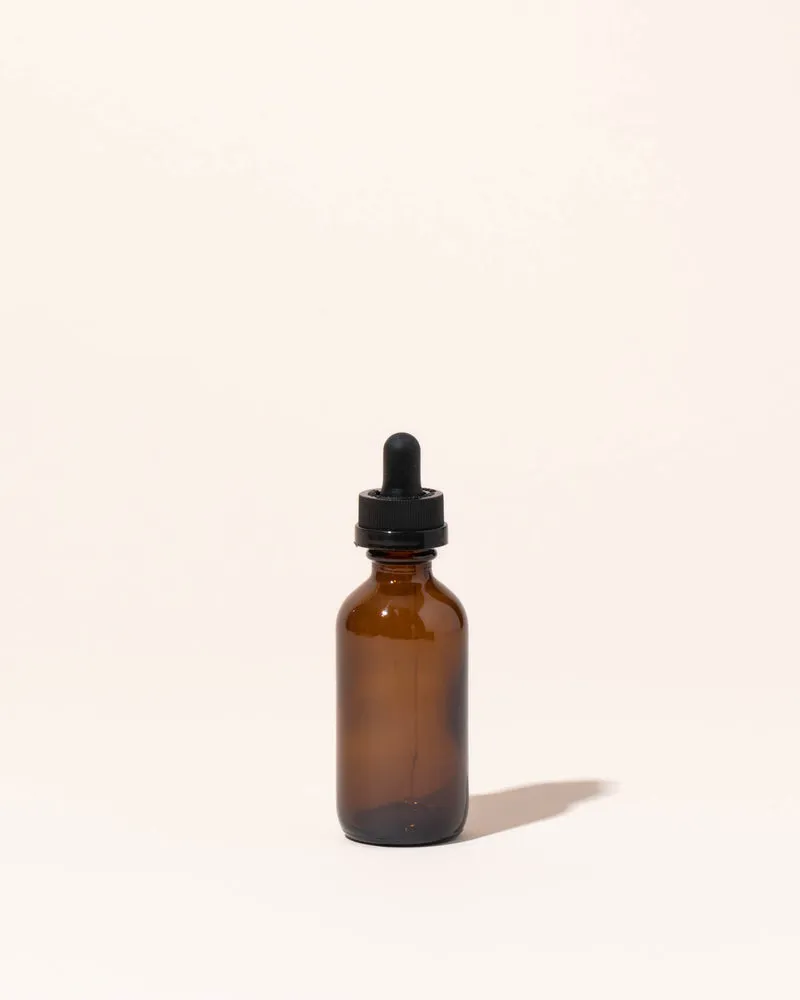 2oz / 59ml translucent amber glass dropper bottle